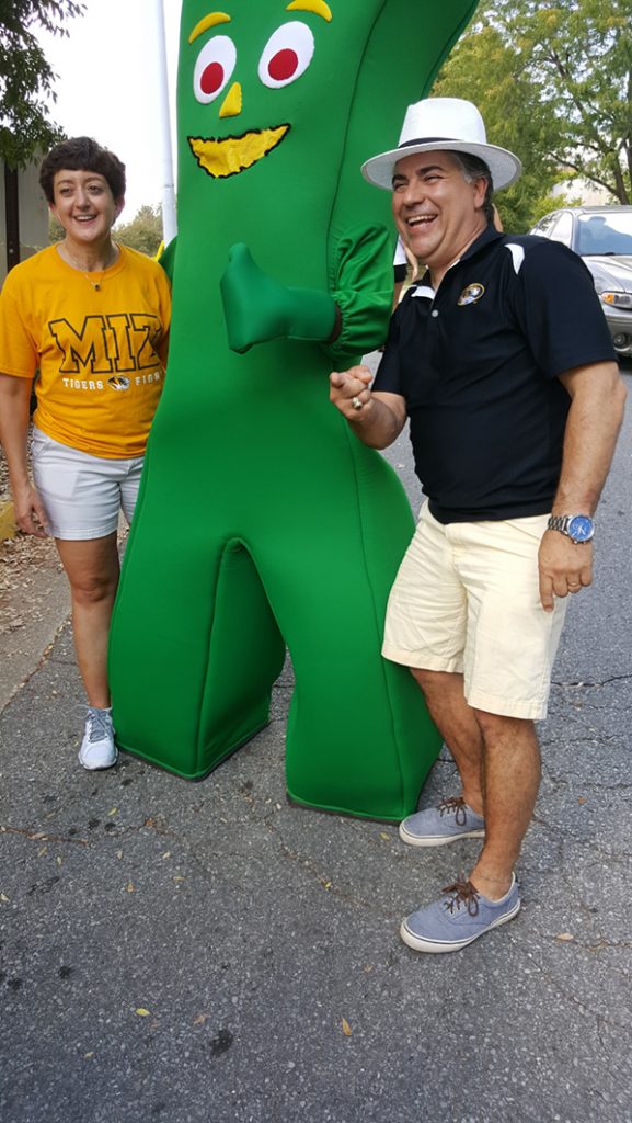 People posing with Gumby.